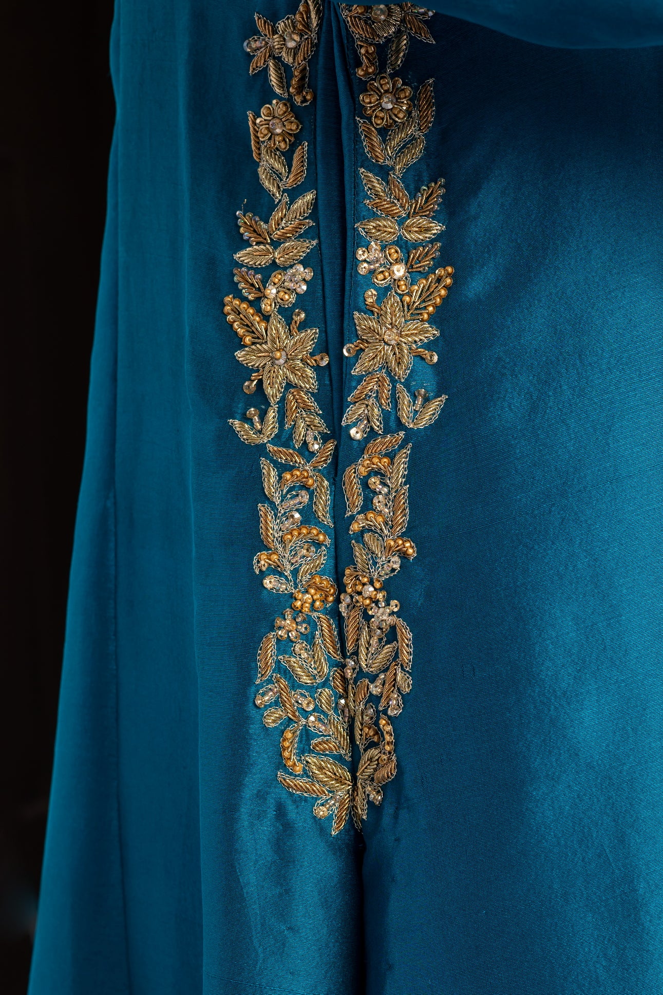 Tara teal raw silk front-open shirt with hand embellishments, straight pants, and chiffon dupatta for parties, dinner events, and formal gatherings by MariamRaj