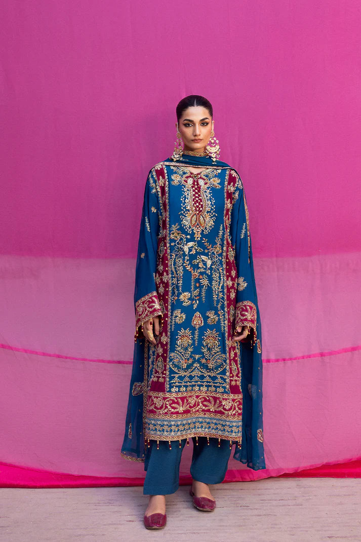 Velanis luxury dark blue chiffon embroidered outfit with handmade neckline, raw silk trouser, and organza embroidered dupatta by Emaan Adeel at Pakistanimoda.com.