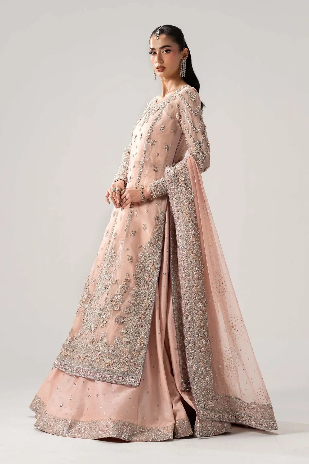 Velmira powder pink luxury organza bridal lehenga with tassel silk lehenga and net dupatta by Maria B
