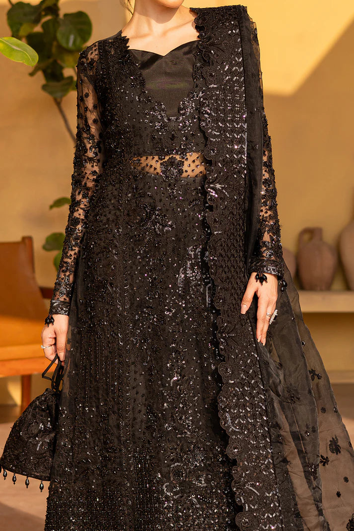 Black organza embroidered formal dress with dupatta and silk trousers.