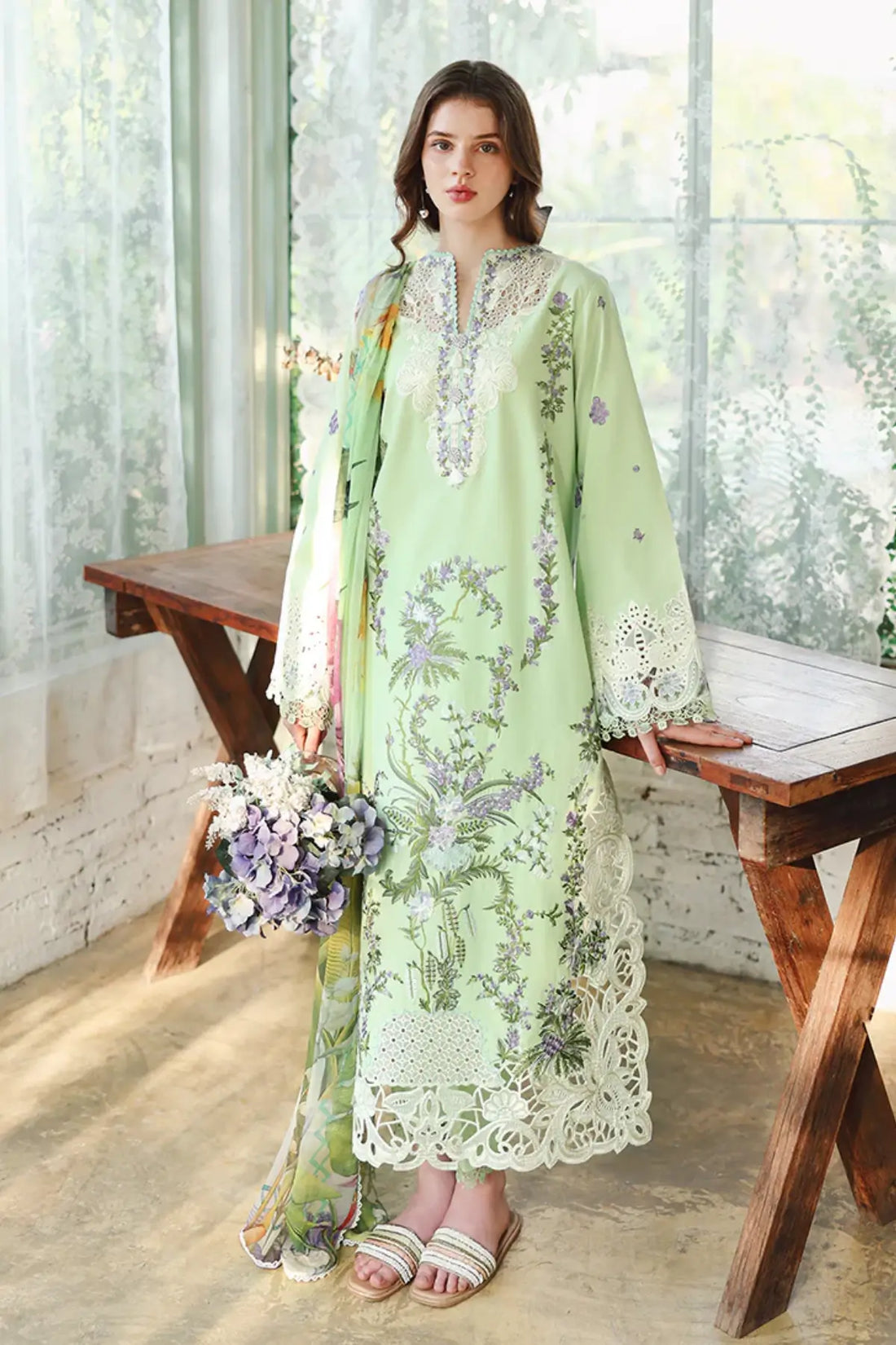 Mushq Verdant Bloom grape green lawn suit with chiffon dupatta, organza daman borders, side slit lace and tassel neckline