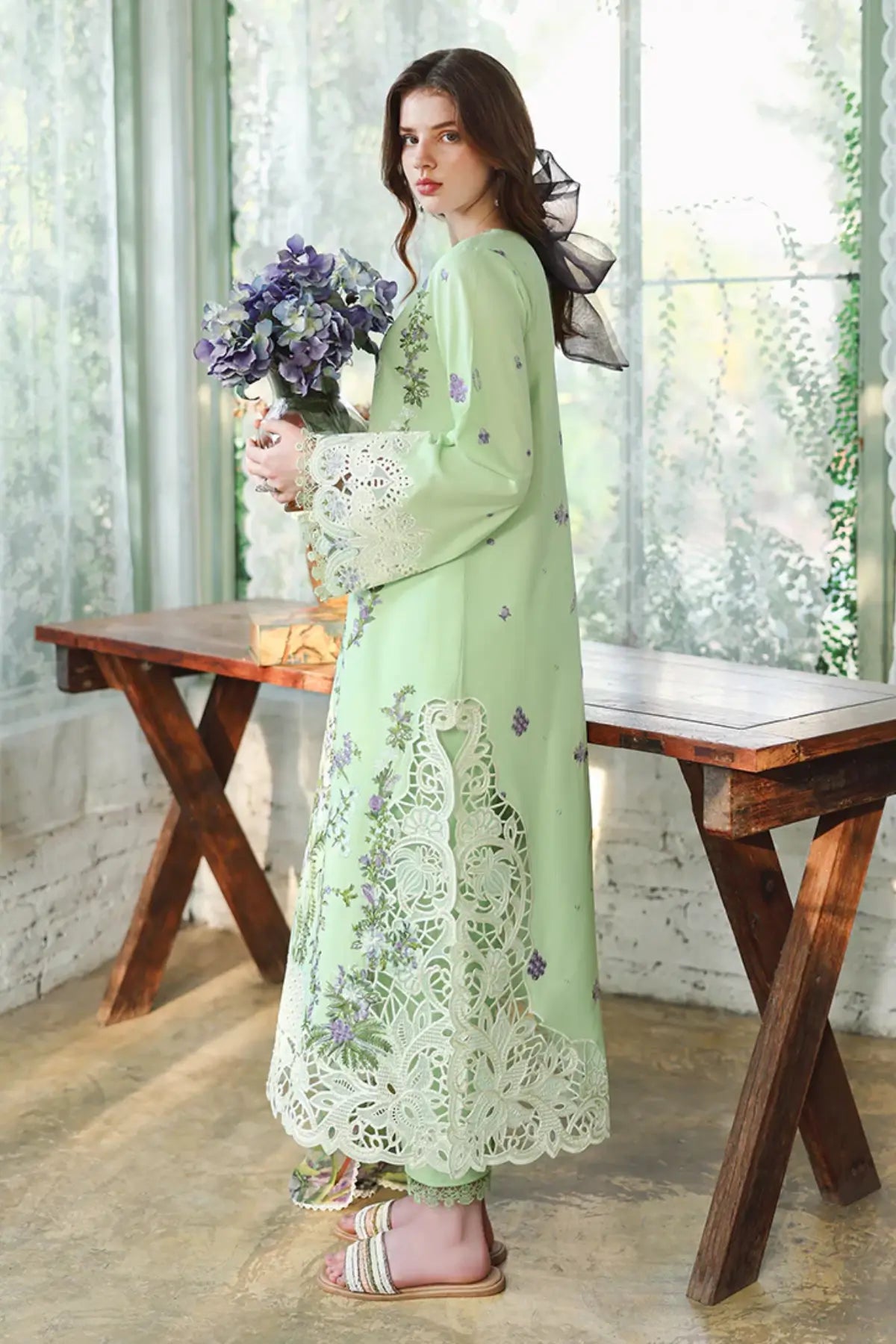 Mushq Verdant Bloom grape green lawn suit with chiffon dupatta, organza daman borders, side slit lace and tassel neckline