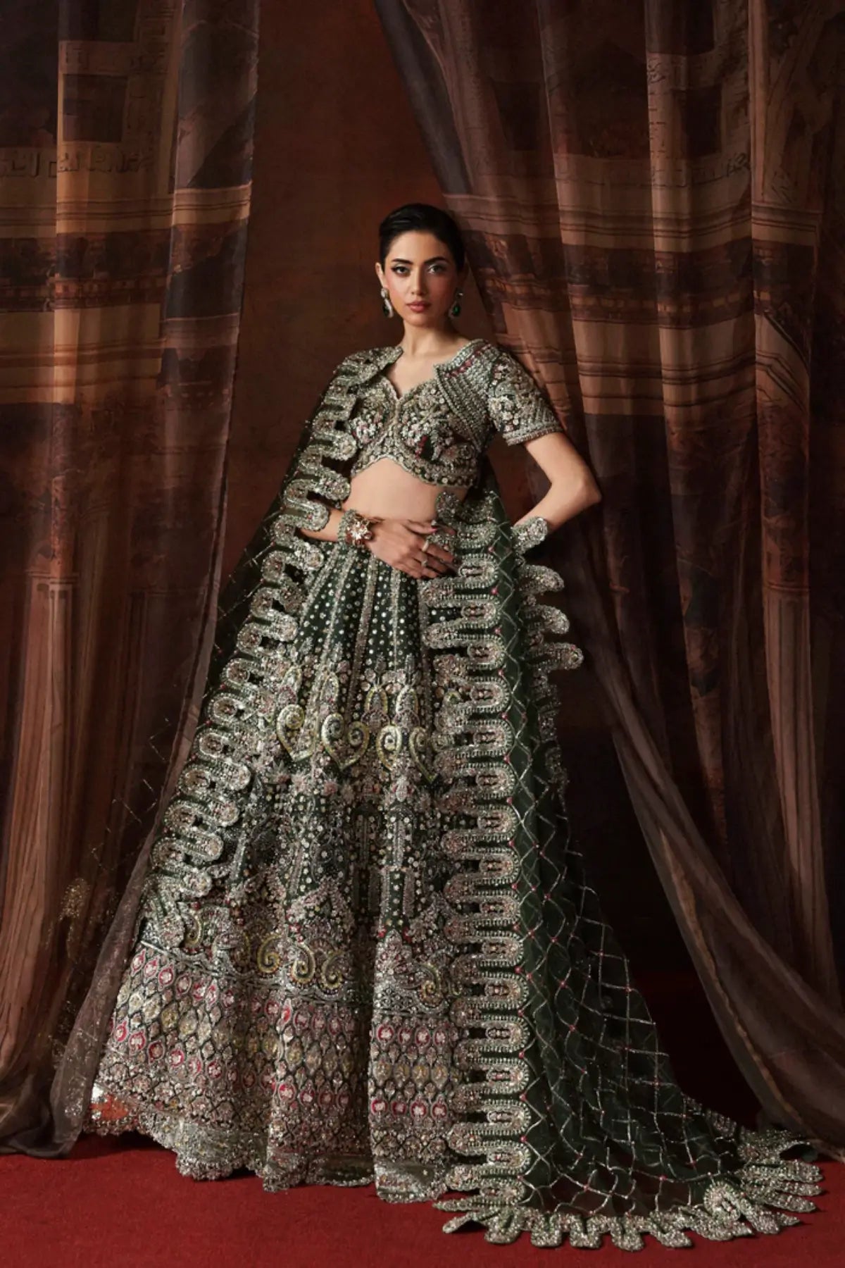 Verdelle emerald green bridal lehenga choli from Akbar Aslam Serena Bridal Edit '26 in organza net with silk inner.