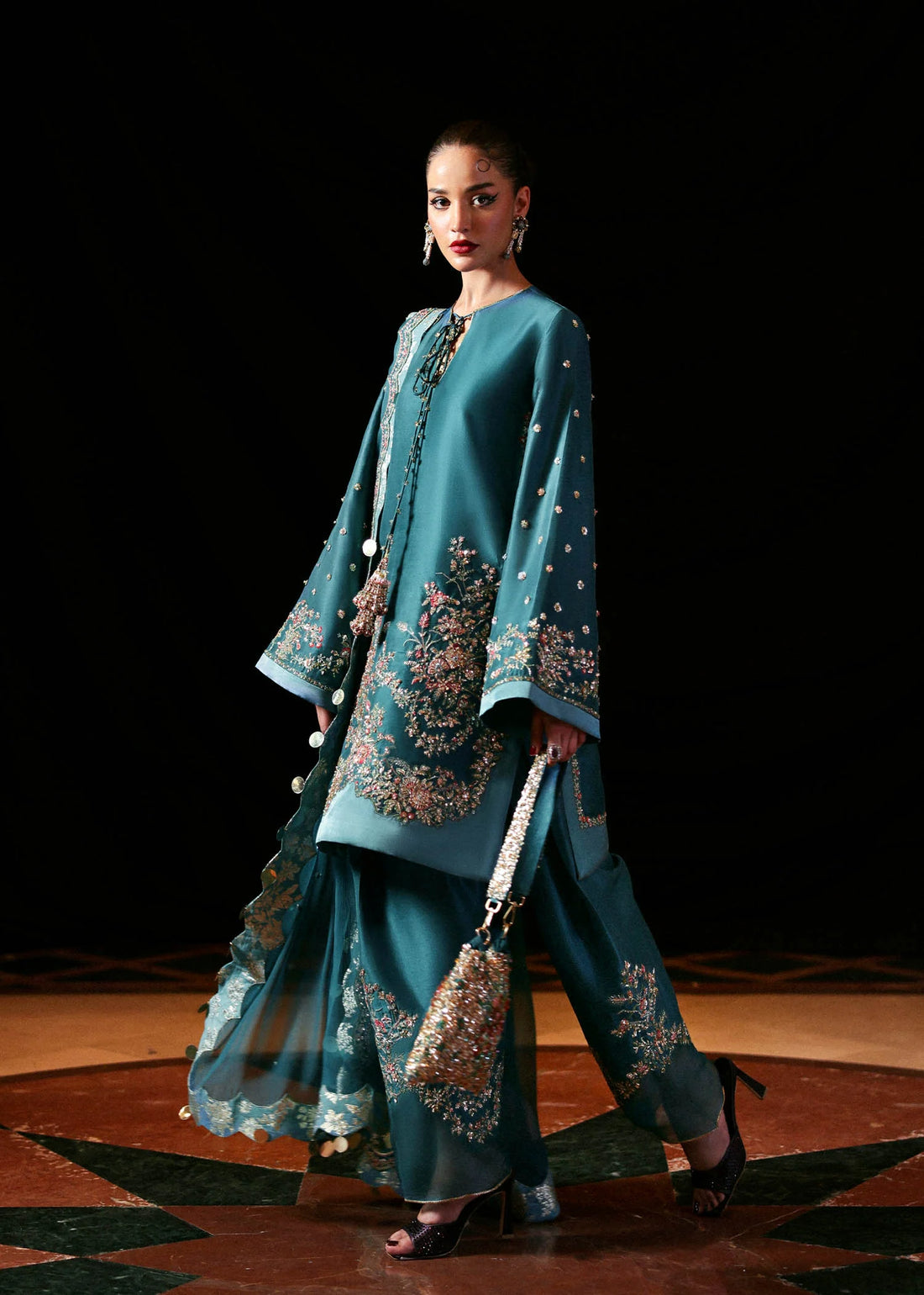 Teal green raw silk embroidered shirt with chiffon dupatta and organza-hem shalwar – Verta three-piece Pakistani formal outfit at Pakistanimoda
