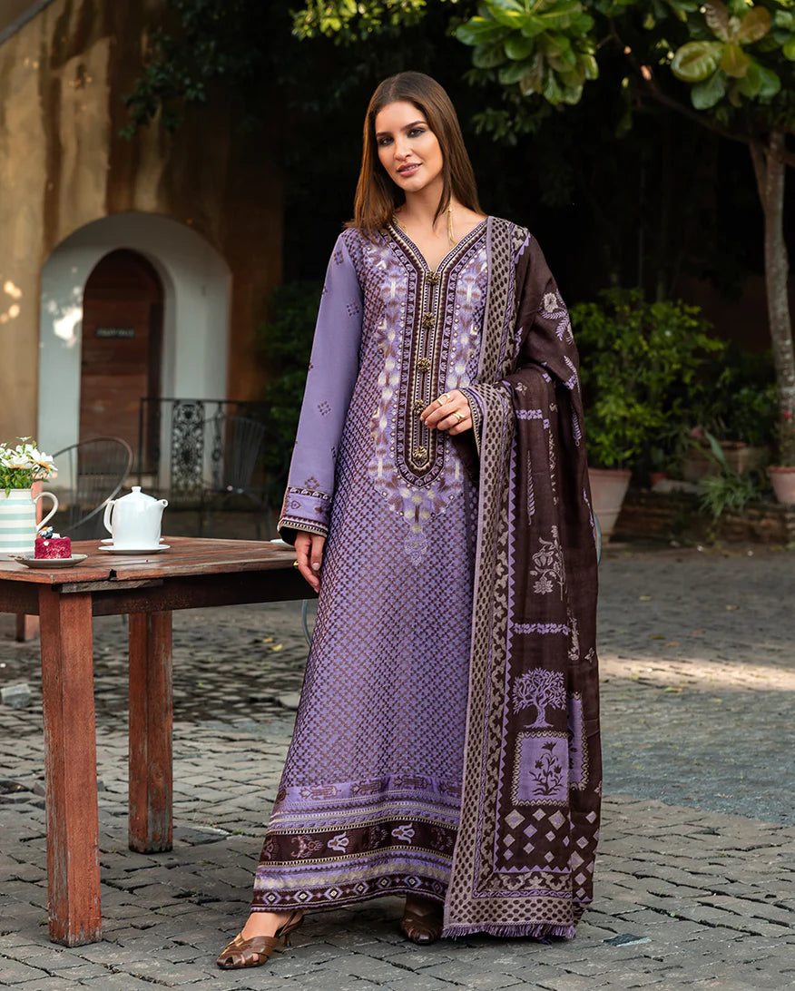 Model wearing Mushq Villa Bramasole muted purple embroidered karandi winter dress with wool shawl – Winter Broadway 2025