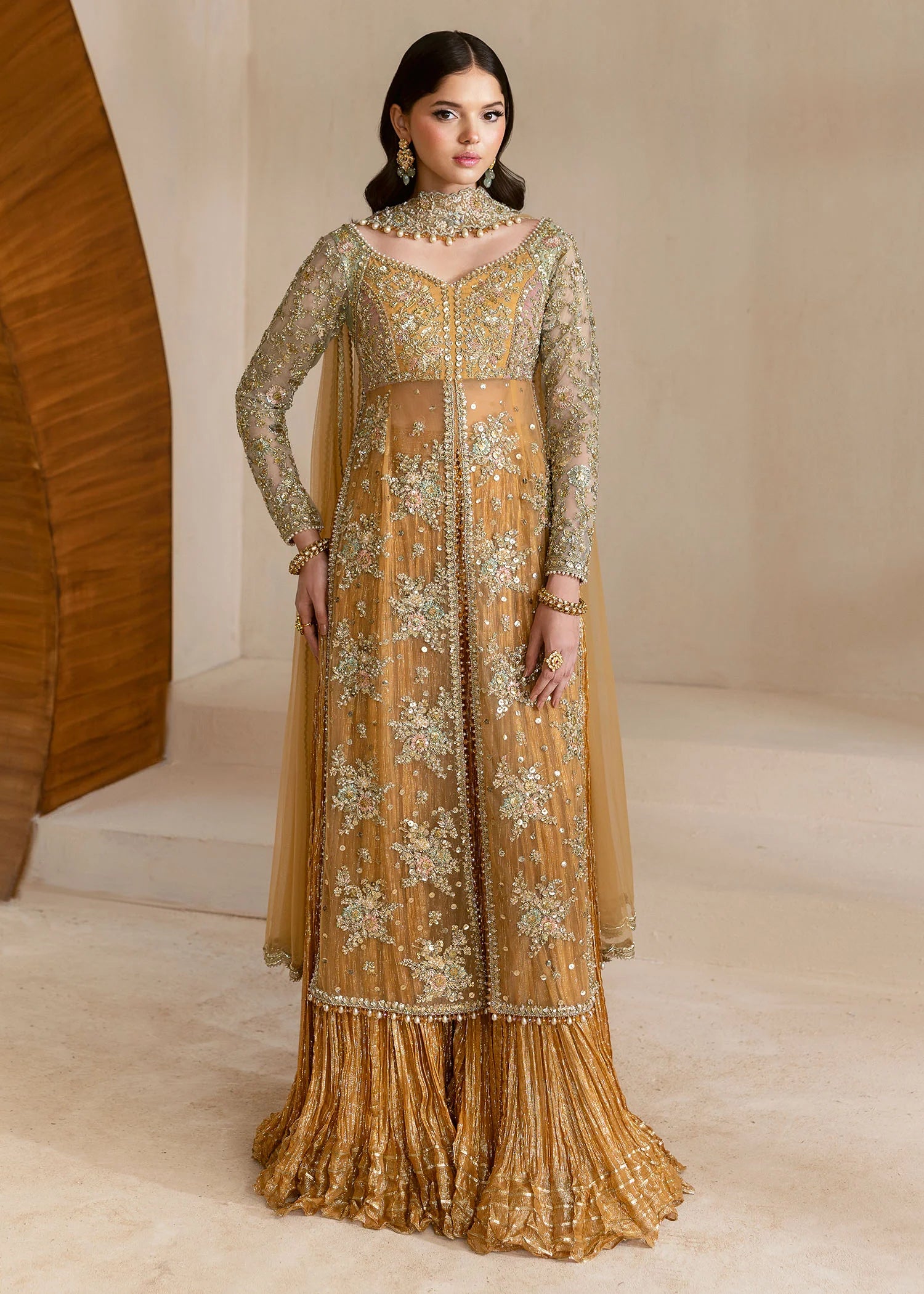Orange heritage-inspired Pakistani sharara suit with net dupatta – Vira by Pakistanimoda