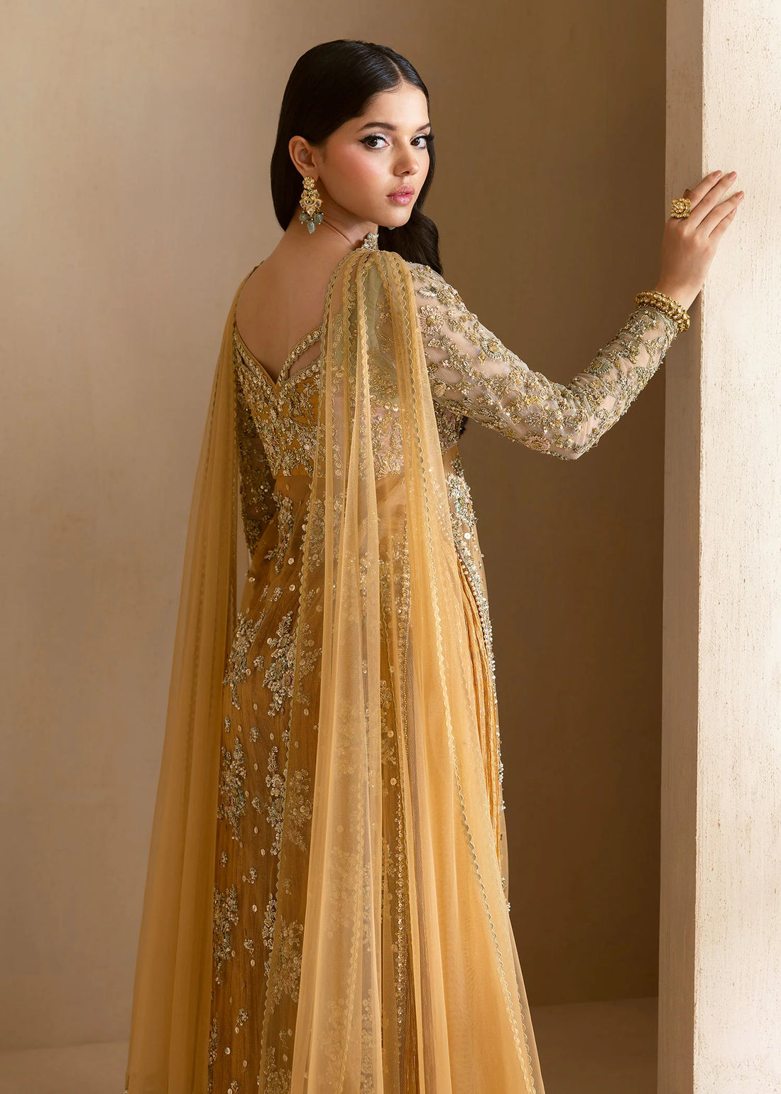 Orange heritage-inspired Pakistani sharara suit with net dupatta – Vira by Pakistanimoda