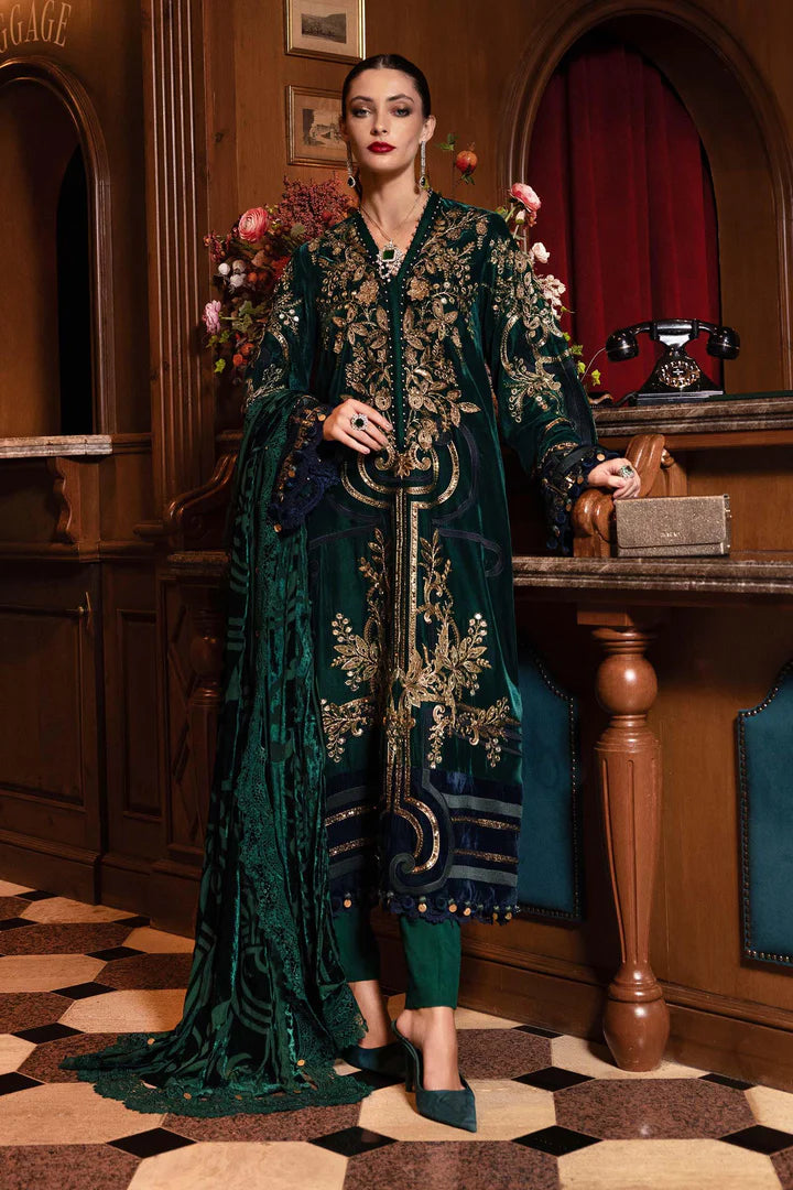 Mariab WL-1302 emerald green velvet stitched suit with 3D flowers, pearls and palachi dupatta – available at Pakistanimoda.com.