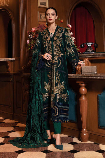 Mariab WL-1302 emerald green velvet stitched suit with 3D flowers, pearls and palachi dupatta – available at Pakistanimoda.com.