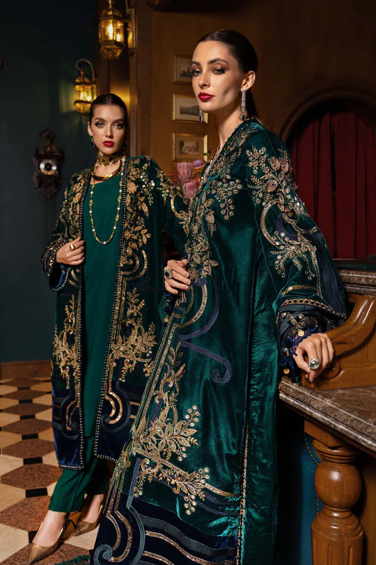 Mariab WL-1302 emerald green velvet stitched suit with 3D flowers, pearls and palachi dupatta – available at Pakistanimoda.com.