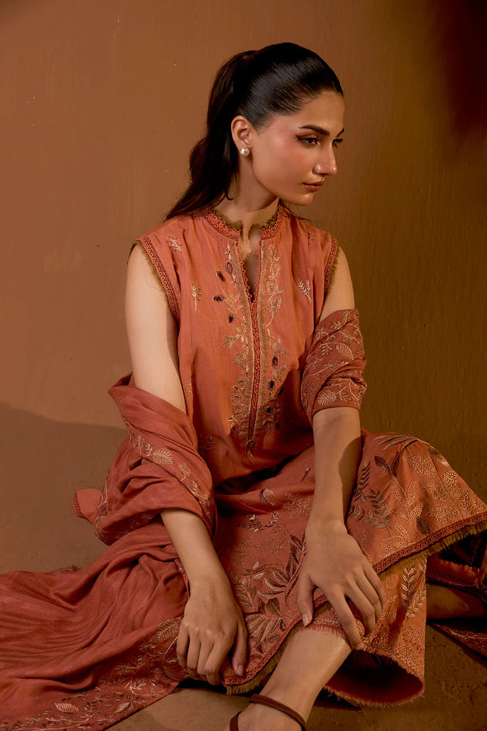 Sobia Nazir WS25-4A rust embroidered khaddar stitched suit with herringbone shawl, available worldwide at Pakistanimoda.