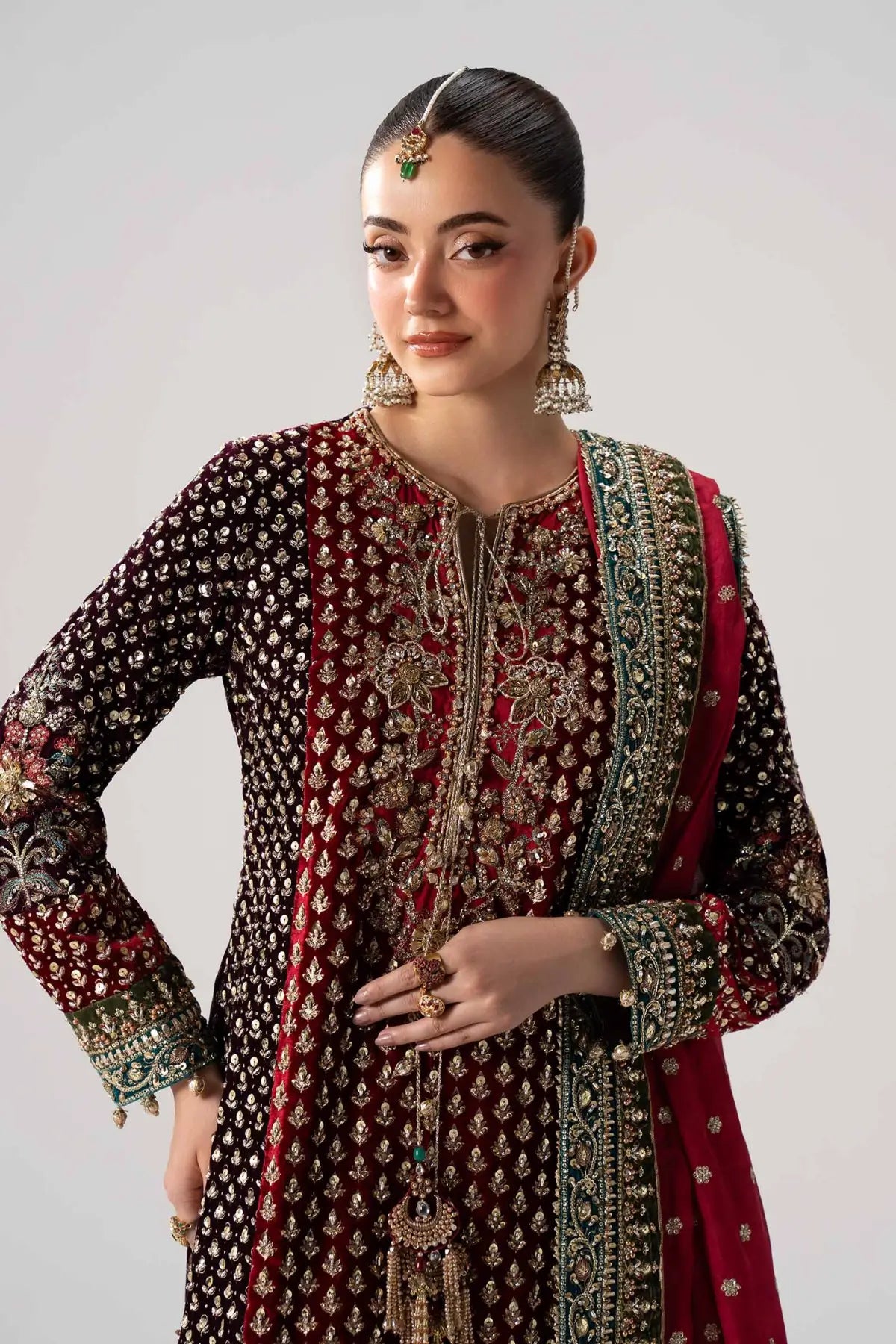 Yarizeh fuchsia pink luxury wedding sharara set with velvet shirt and silk dupatta by Maria B