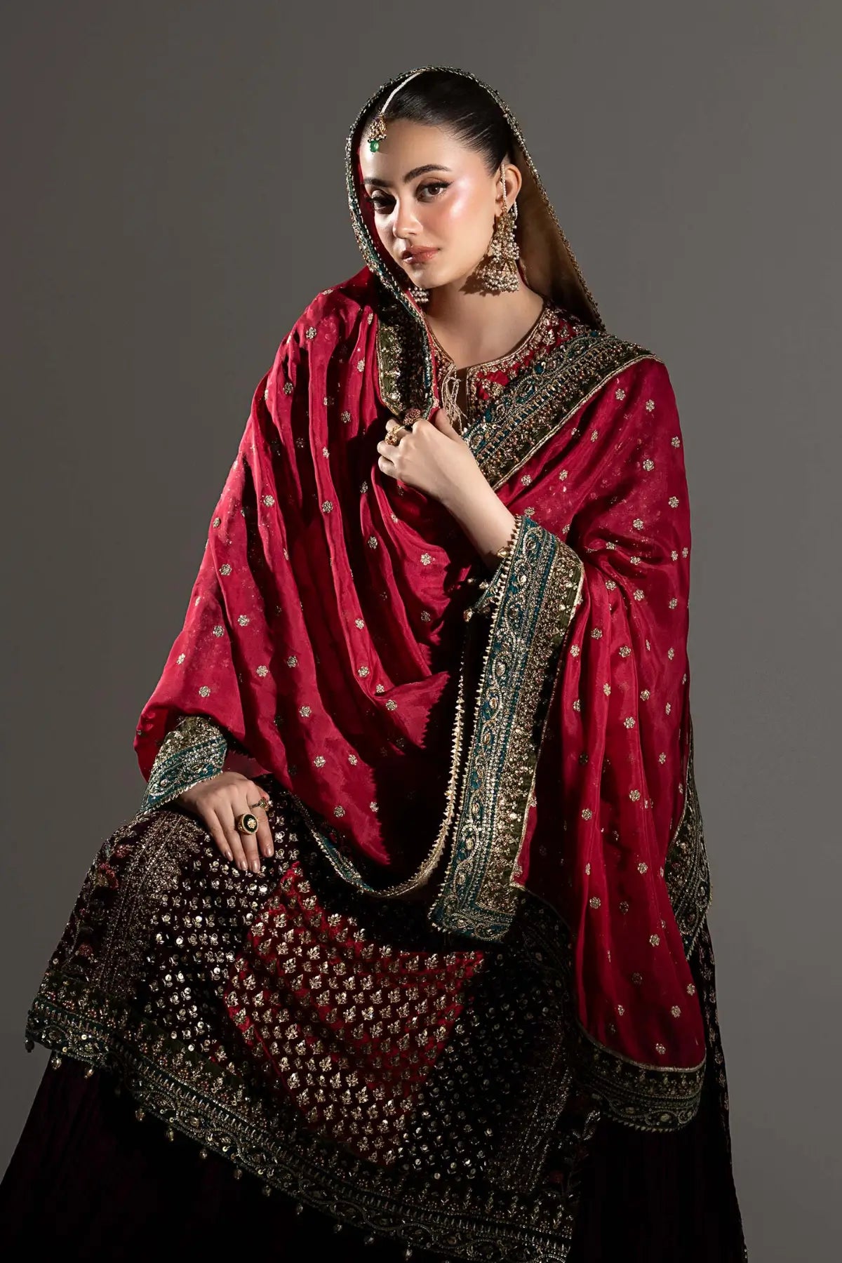 Yarizeh fuchsia pink luxury wedding sharara set with velvet shirt and silk dupatta by Maria B