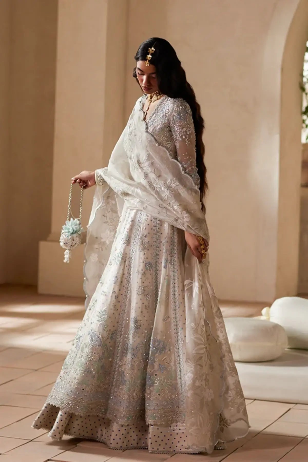 Yasmira off white embellished organza Pakistani formal suit with embroidered shirt, silk lehenga and scalloped organza dupatta