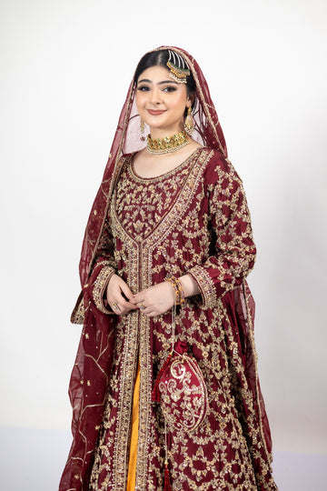 Yumna bridal ensemble by MariamRaj: Maroon raw silk front-open shirt, rust farshi lehnga, net organza dupatta, intricate embroidery for weddings and receptions