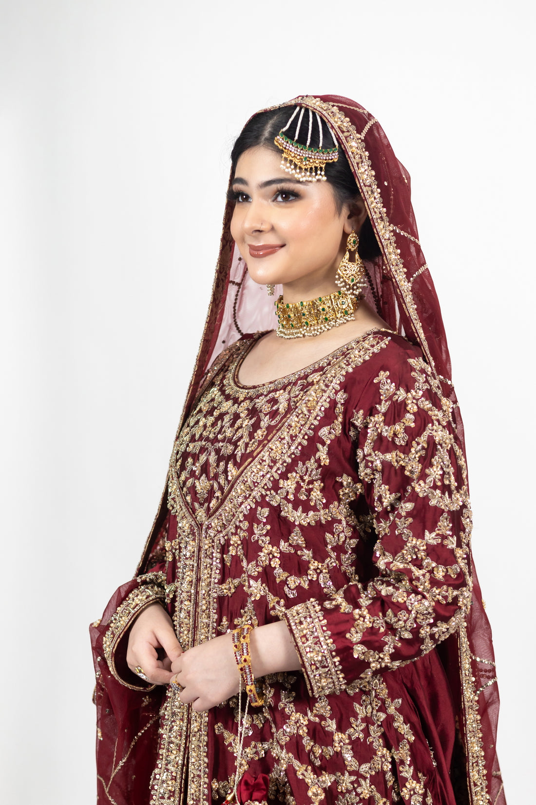 Yumna bridal ensemble by MariamRaj: Maroon raw silk front-open shirt, rust farshi lehnga, net organza dupatta, intricate embroidery for weddings and receptions