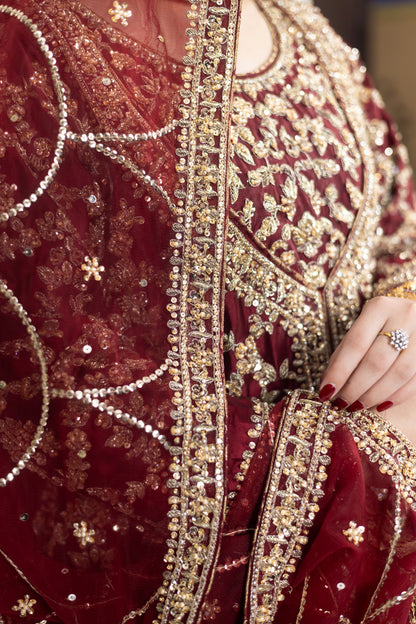 Yumna bridal ensemble by MariamRaj: Maroon raw silk front-open shirt, rust farshi lehnga, net organza dupatta, intricate embroidery for weddings and receptions