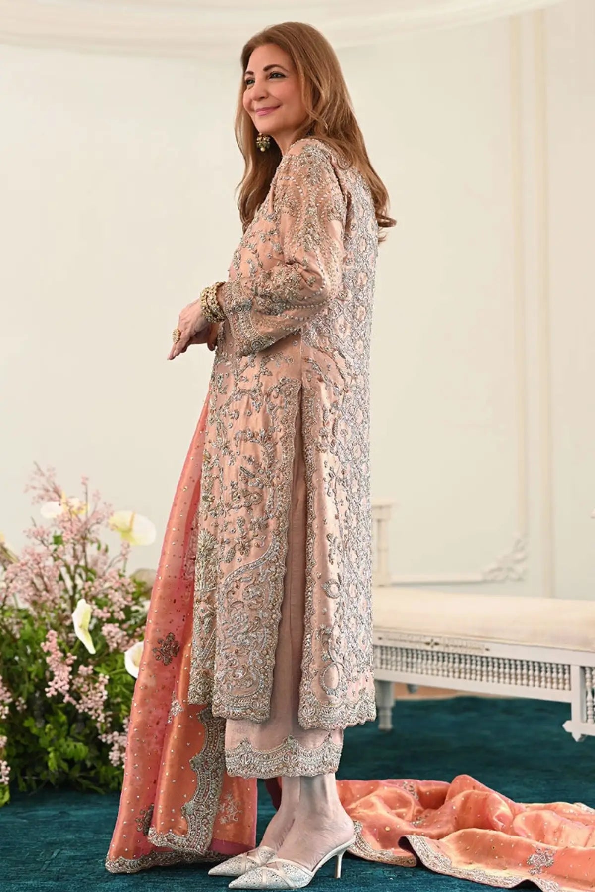 Zahia rose gold stitched formal dress for wedding guests at Pakistanimoda with hand embellishment, lame silk shirt and worked izaar