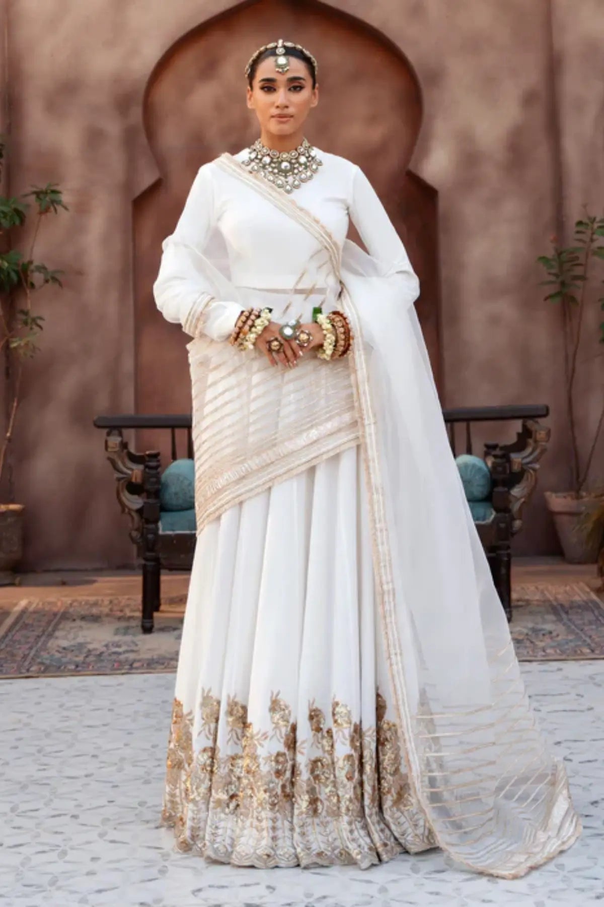 Zaib white embroidered raw silk lehenga choli with organza dupatta
