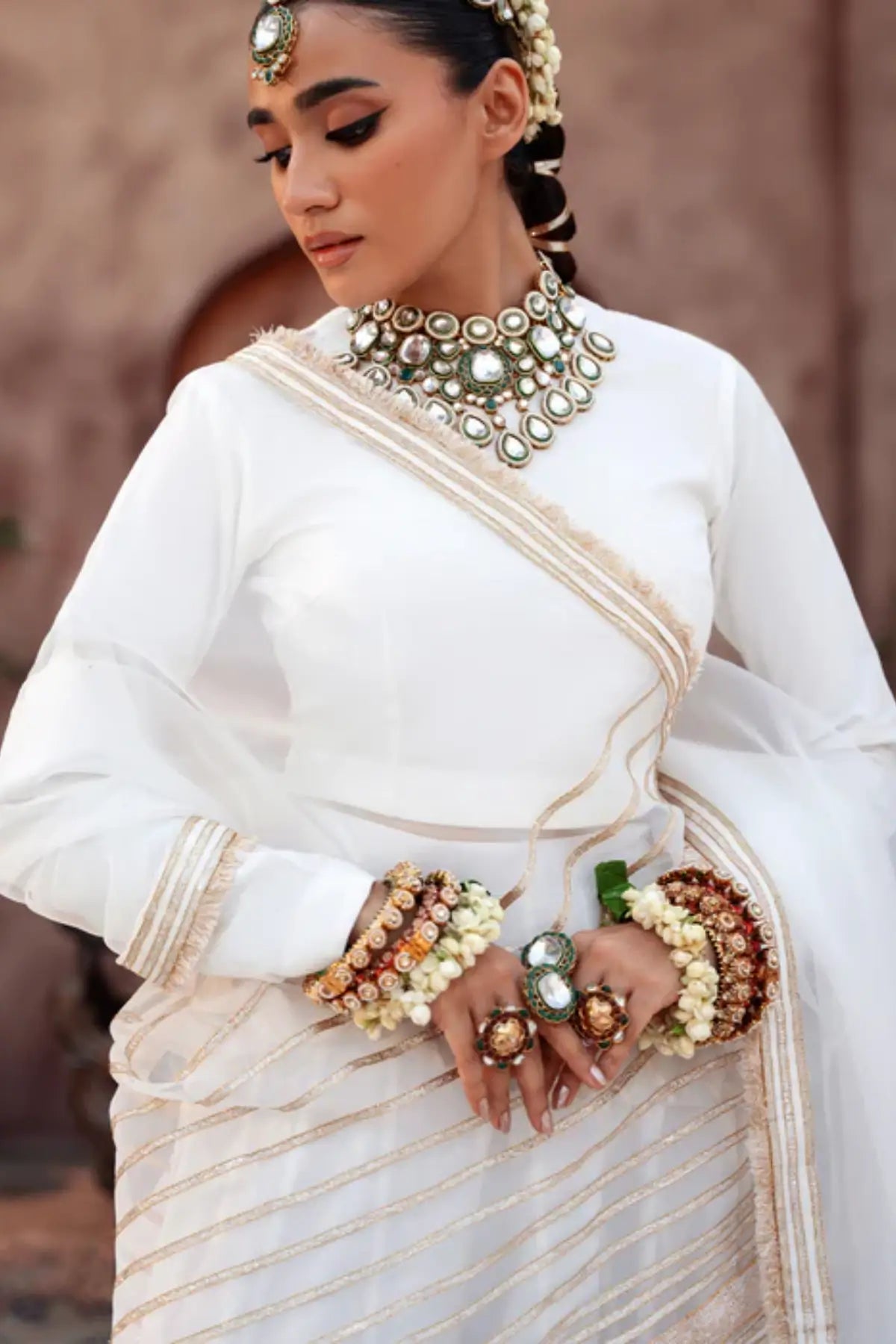 Zaib white embroidered raw silk lehenga choli with organza dupatta