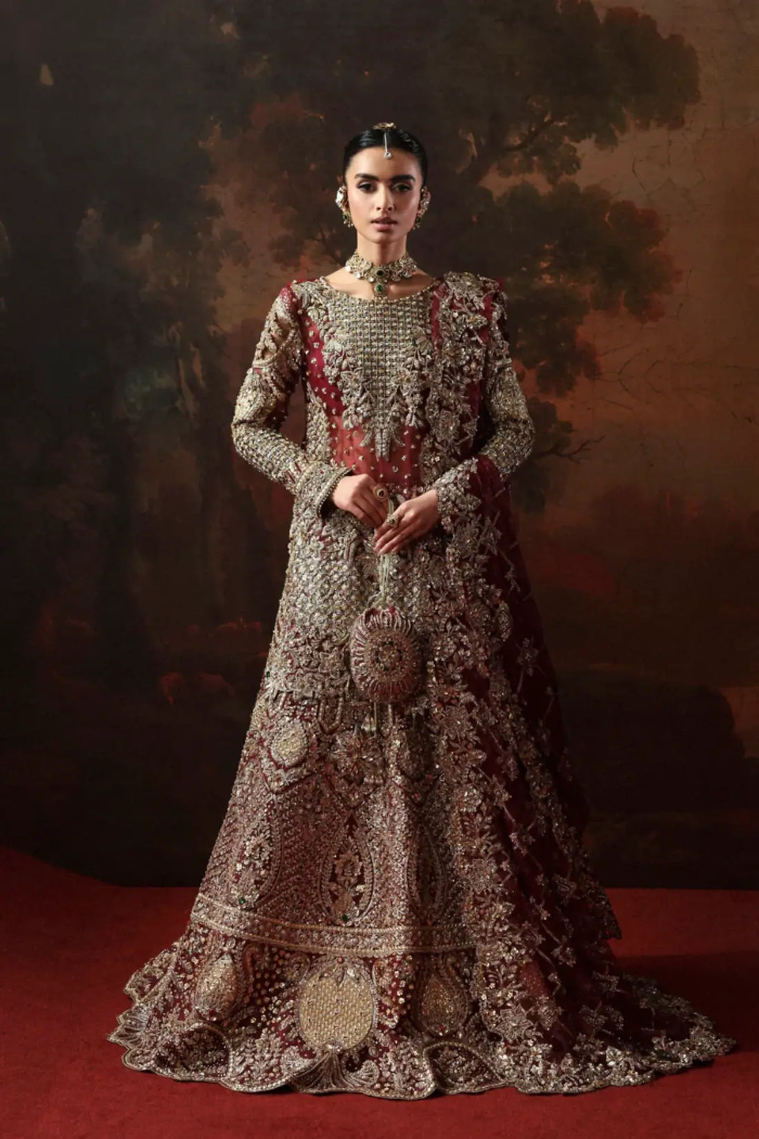 Zarielle maroon bridal lehenga kurti from Akbar Aslam Serena Bridal Edit '26 crafted in organza with silk inner.