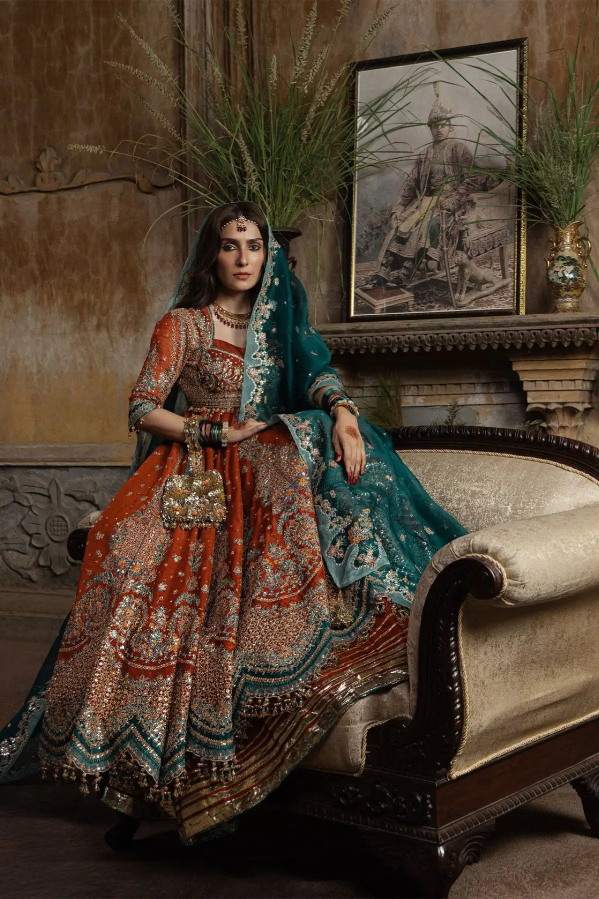 Zarin Hussain Rehar rust orange embellished stitched Peshwas and lehenga with emerald green embroidered organza dupatta