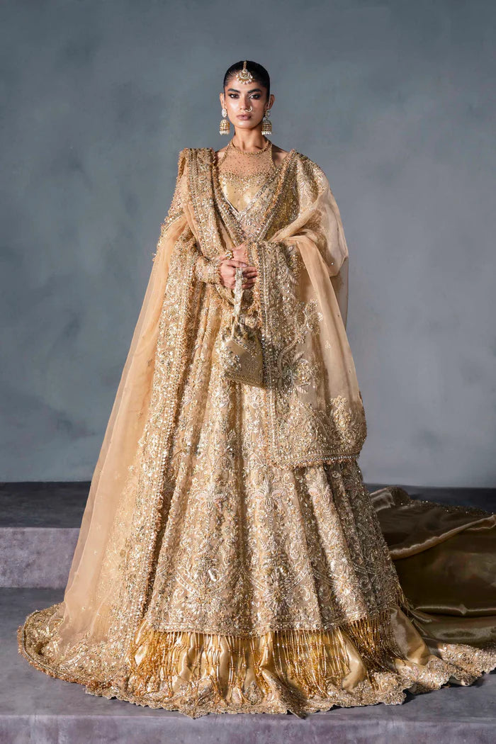 Gold Pakistani bridal lehenga with zardozi, resham, and sequin handwork. Includes scalloped dupatta and bridal pouch – ideal for weddings in USA and Canada.
