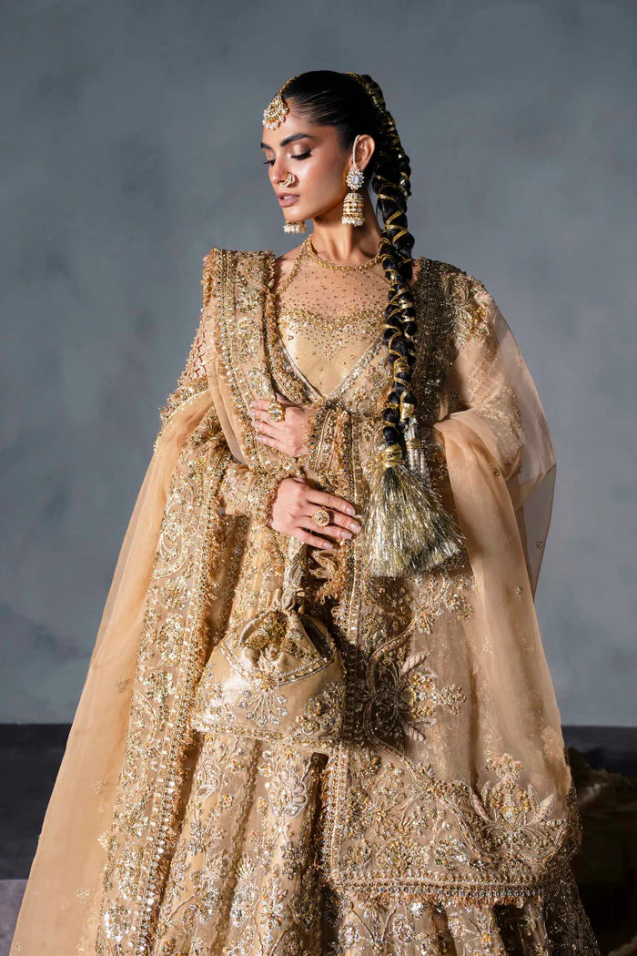 Gold Pakistani bridal lehenga with zardozi, resham, and sequin handwork. Includes scalloped dupatta and bridal pouch – ideal for weddings in USA and Canada.