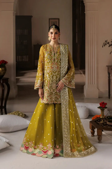 Zarminay dark yellow embroidered organza stitched Mehndi dress with floral detailing, raw silk trouser and embellished poly net dupatta