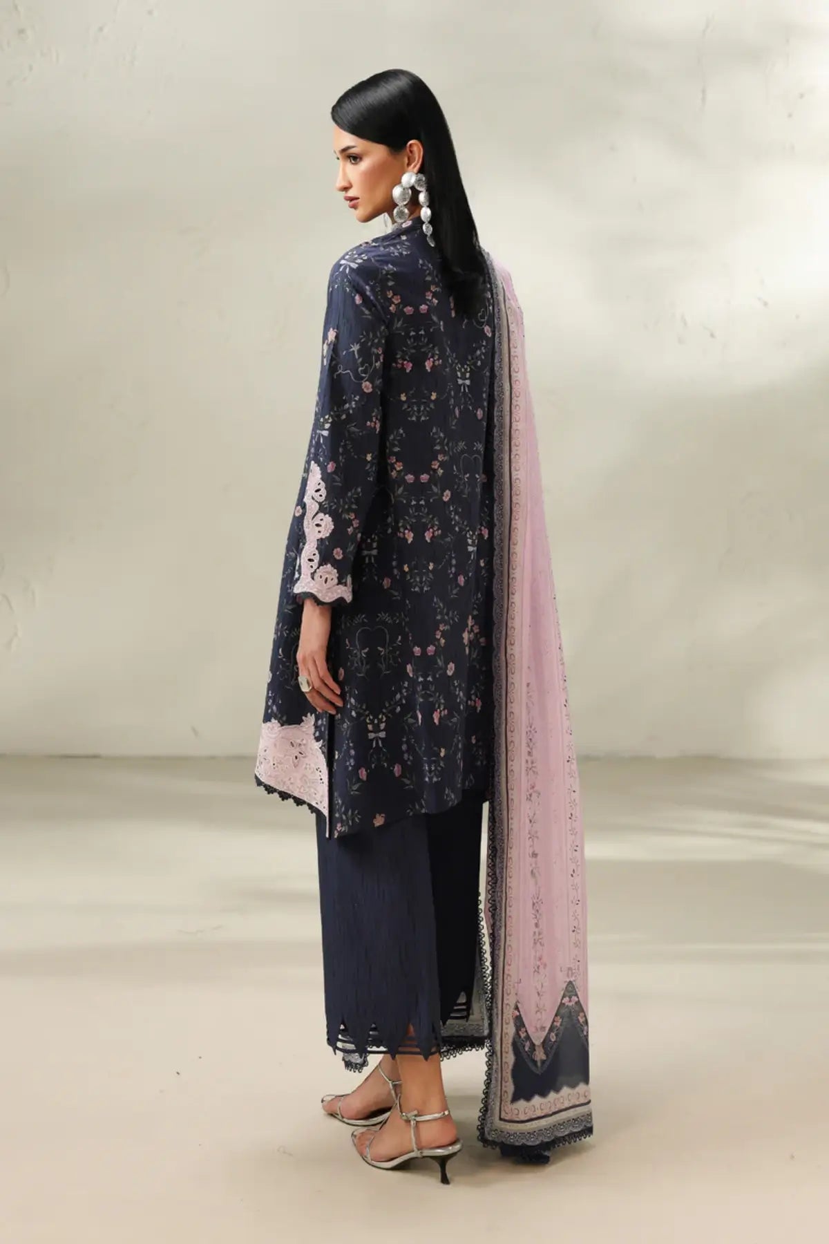 Zeena QQP-03(A) by Qalamkar navy blue lawn stitched 3PC suit with embroidered front panel, printed lawn dupatta, and printed cotton trousers.