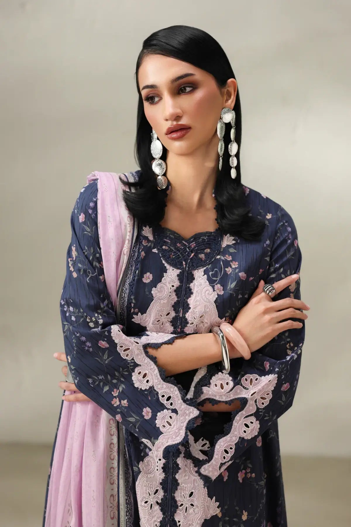 Zeena QQP-03(A) by Qalamkar navy blue lawn stitched 3PC suit with embroidered front panel, printed lawn dupatta, and printed cotton trousers.