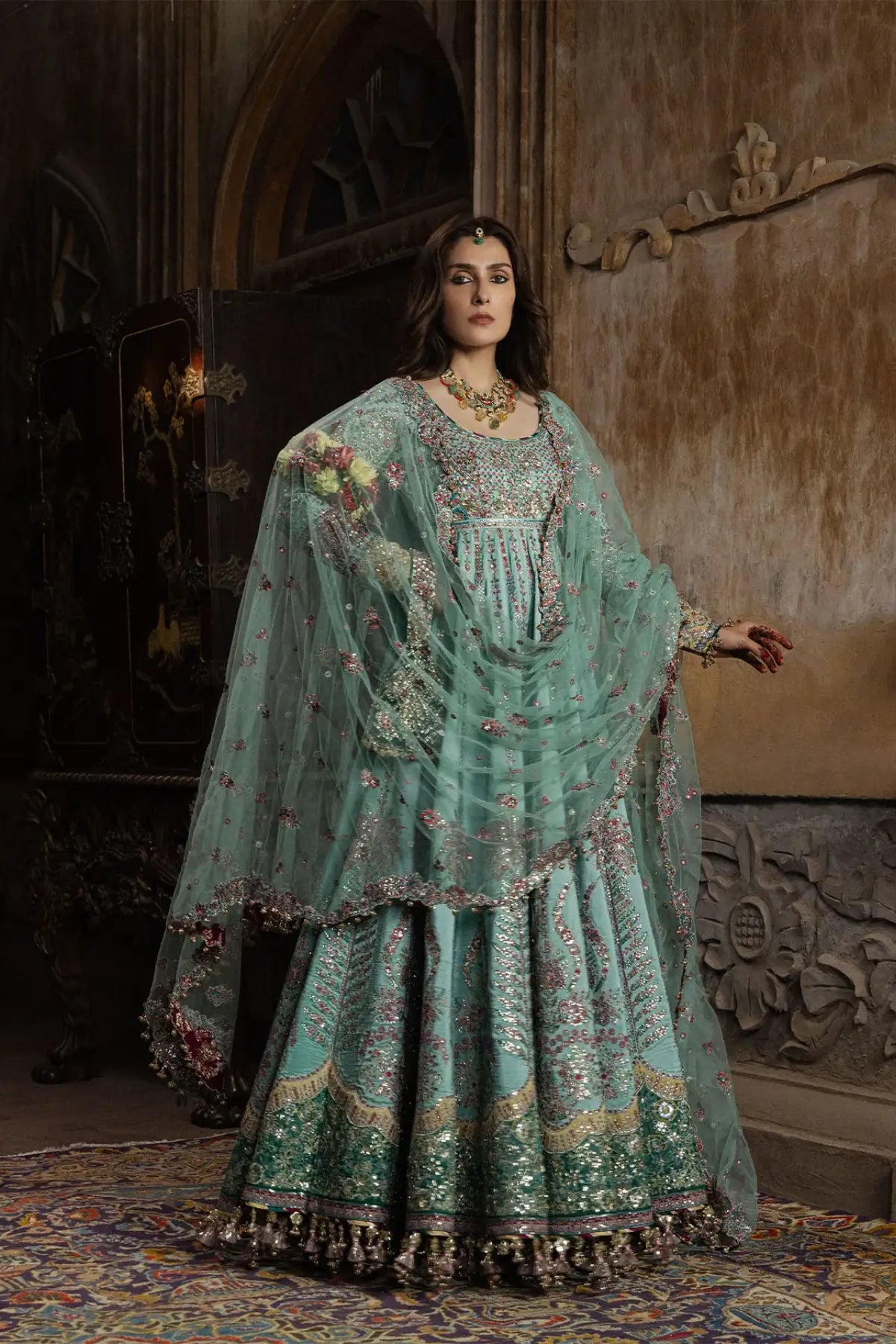 Zeenat Hussain Rehar aqua green embellished stitched Peshwas with fuchsia pink churidar and embroidered net dupatta