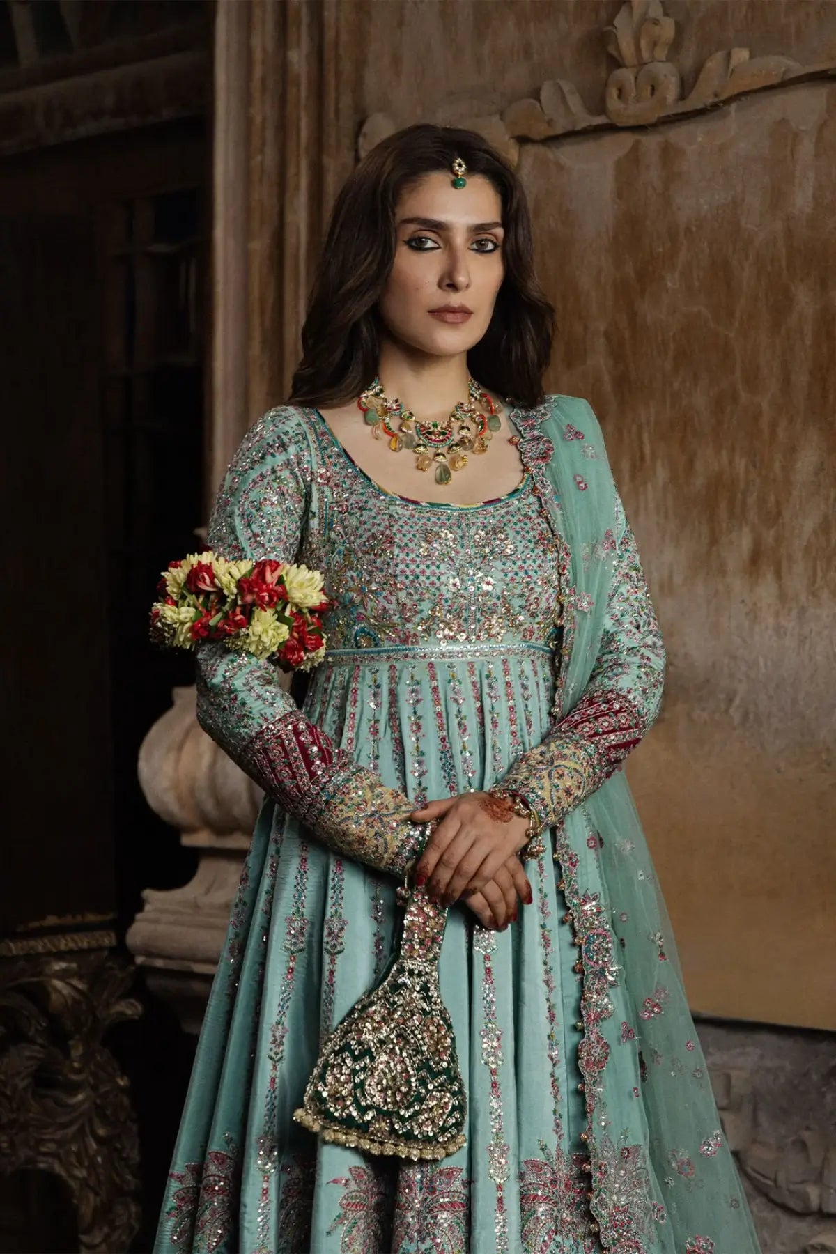 Zeenat Hussain Rehar aqua green embellished stitched Peshwas with fuchsia pink churidar and embroidered net dupatta
