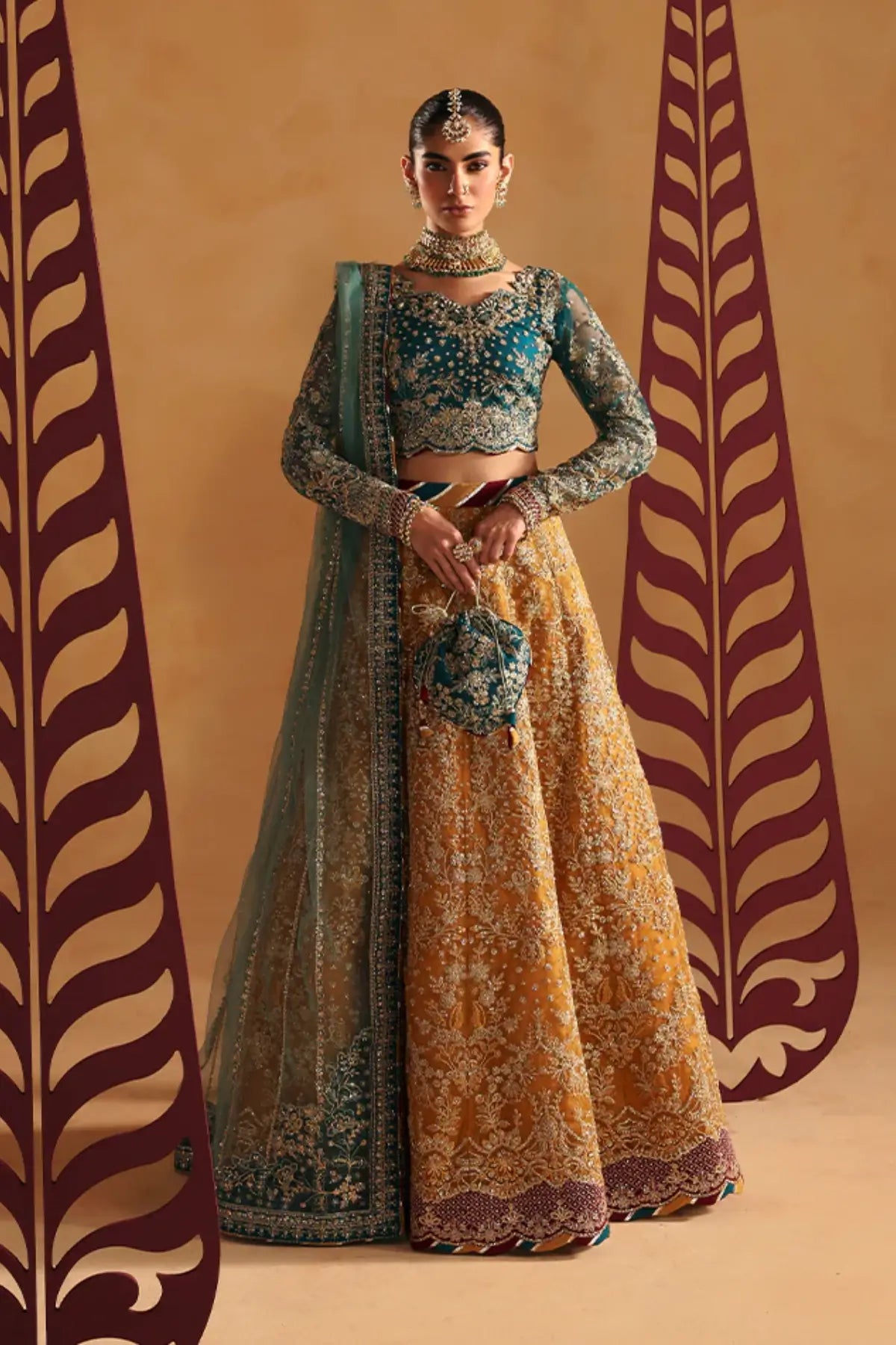 Zoia by Gulaal mustard formal lehenga choli with turquoise choli and sea green dupatta stitched and available online at Pakistanimoda.