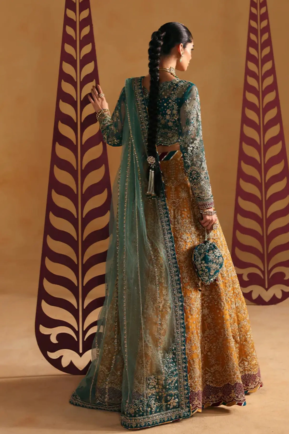 Zoia by Gulaal mustard formal lehenga choli with turquoise choli and sea green dupatta stitched and available online at Pakistanimoda.