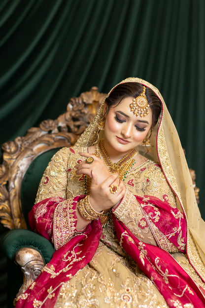 Zuleikha Pakistani bridal wear gold net maxi with red organza dupatta & silk pants – couture outfit by MariamRaj.com.