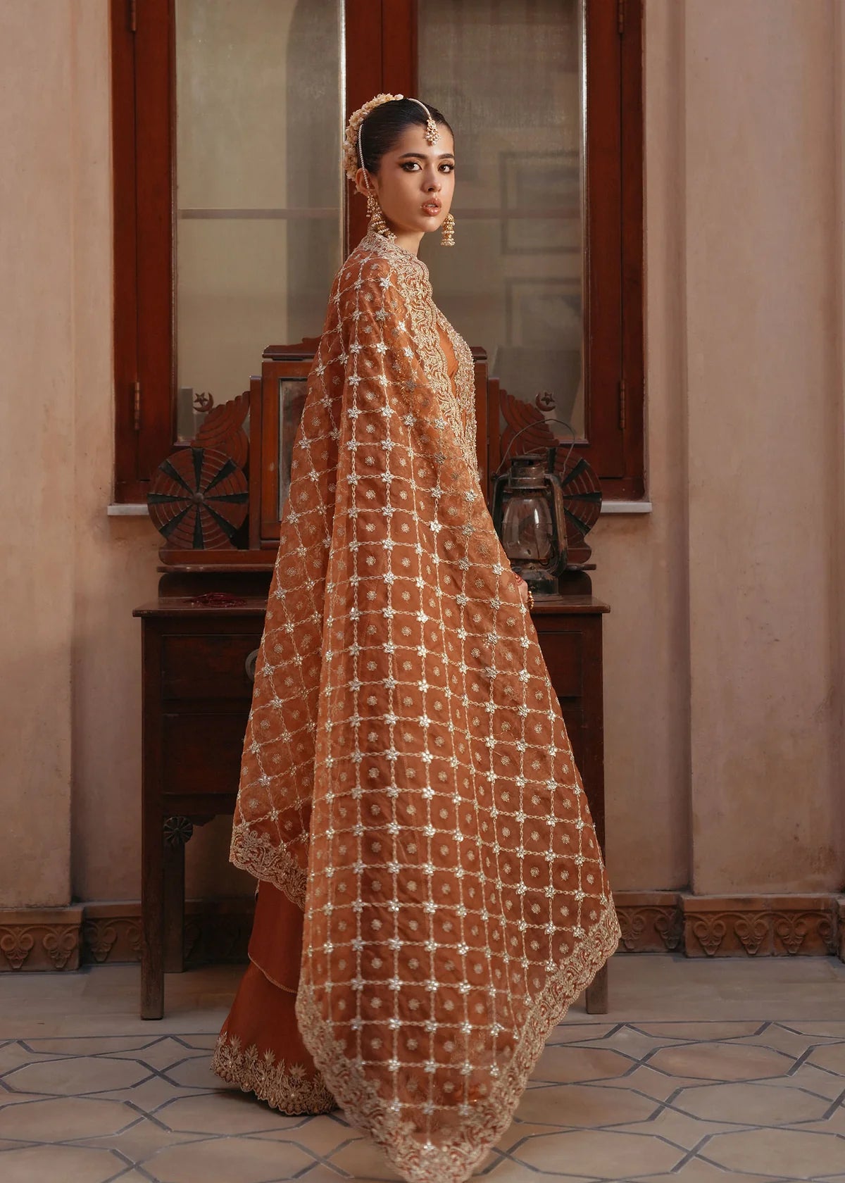 Zulekha golden mocha Korean silk formal wear with embroidered neckline, flared pants, and organza dupatta by Kanwal Malik from the Saheli Luxury Pret Collection.