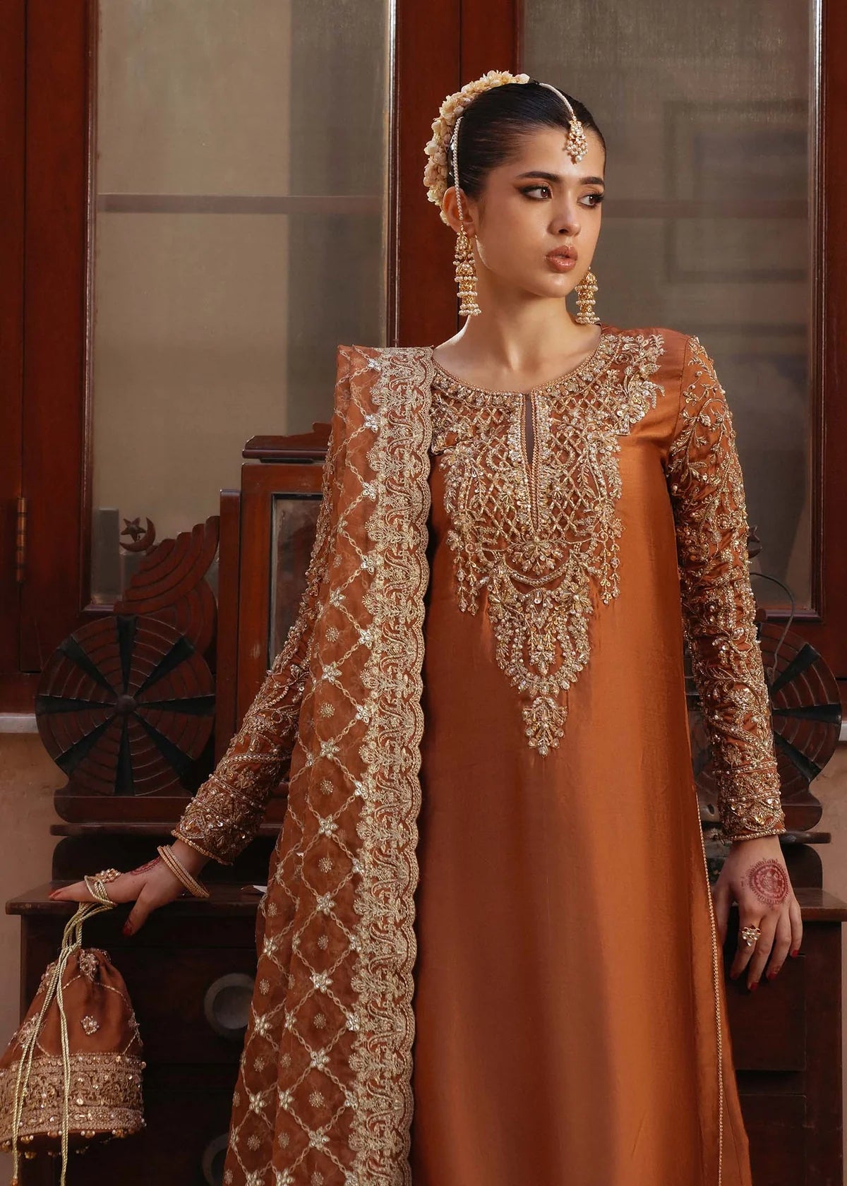 Zulekha golden mocha Korean silk formal wear with embroidered neckline, flared pants, and organza dupatta by Kanwal Malik from the Saheli Luxury Pret Collection.